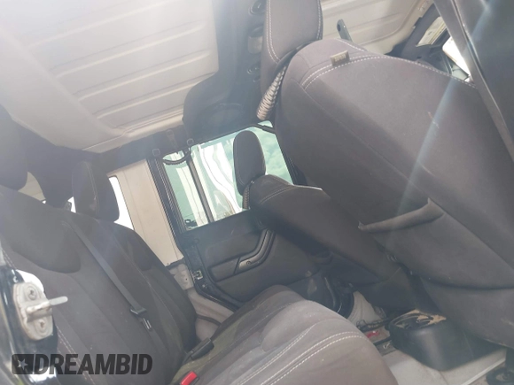 2014 Jeep Wrangler Unlimited Rubicon X with VIN 1C4HJWFG3EL274905, listed as a IAAI auction lot 41512631 with 123,961 mi miles and . Bid and sale history available at DreamBid. Image 8.