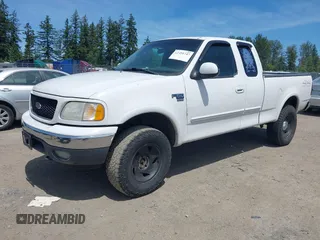 2000 Ford F-150 XL with VIN 1FTRX18W2YKA46754, listed as a IAAI auction lot 42451747 with Not provided miles and . Bid and sale history available at DreamBid. Image 2.