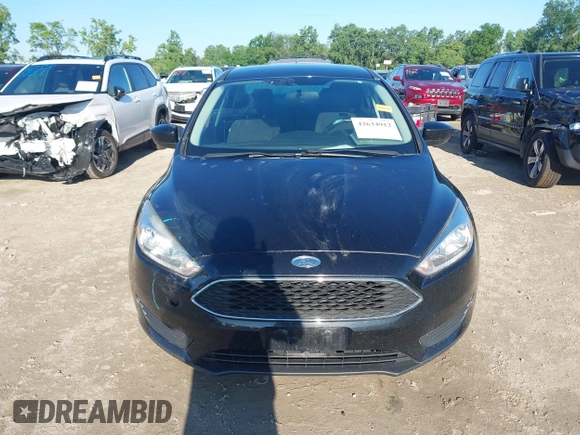2018 Ford Focus SE with VIN 1FADP3FEXJL286396, listed as a IAAI auction lot 42634912 with 73,769 mi miles and . Bid and sale history available at DreamBid. Image 12.