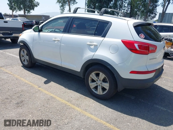 2013 Kia Sportage LX with VIN KNDPB3A23D7514304, listed as a IAAI auction lot 42544397 with 82,456 mi miles and . Bid and sale history available at DreamBid. Image 3.