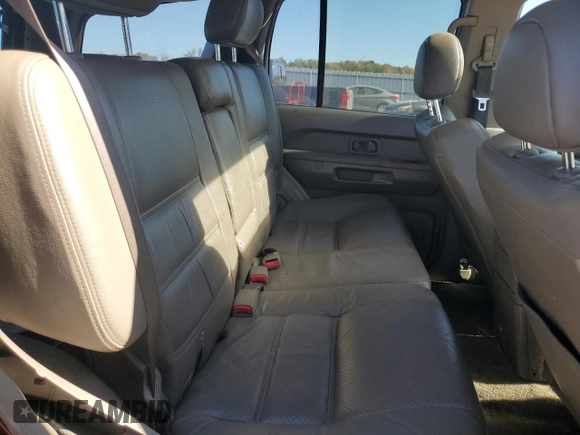 2003 Nissan Pathfinder LE z VIN JN8DR09Y63W835297, wystawiony jako Copart lot #76980904 z przebiegiem 254 778 mil mil oraz Szkoda całkowita • Salvage title. Historia ofert i sprzedaży dostępna na DreamBid. Obrazek 11.