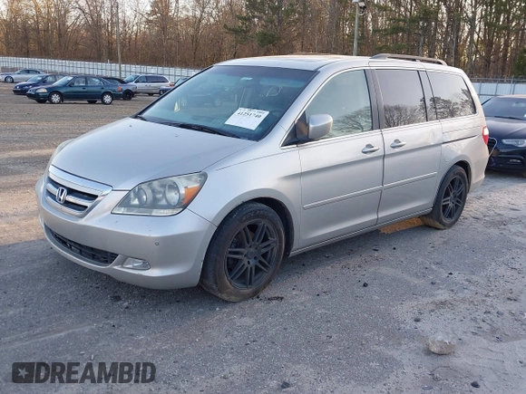 2006 Honda Odyssey Touring z VIN 5FNRL38856B098897, wystawiony jako IAAI lot #41251740 z przebiegiem 258 408 mil mil oraz . Historia ofert i sprzedaży dostępna na DreamBid. Obrazek 2.