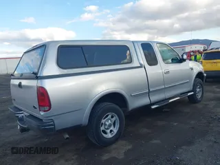 1998 Ford F-150 with VIN 2FTZX18W5WCA42375, listed as a IAAI auction lot 41724649 with 71,034 mi miles and . Bid and sale history available at DreamBid. Image 4.