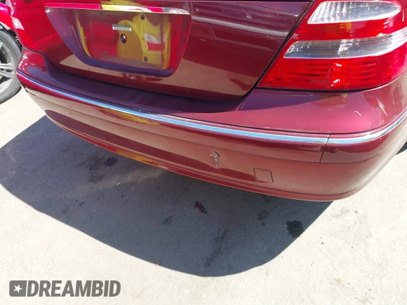 2005 Mercedes-Benz E-Class 3.2L with VIN WDBUF65J15A637760, listed as a IAAI auction lot 41842173 with 97,439 mi miles. Bid and sale history available at carsss.com. Image 13.