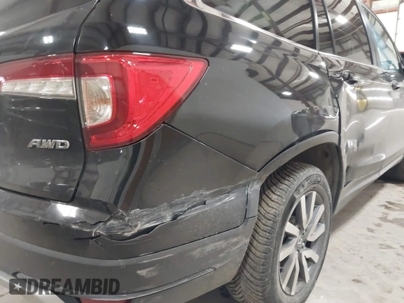 2019 Honda Pilot EX-L with VIN 5FNYF6H5XKB067858, listed as a IAAI auction lot 41643807 with 102,114 mi miles and . Bid and sale history available at carsss.com. Image 14.