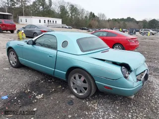 2002 Ford Thunderbird w/Hardtop Premium with VIN 1FAHP60A12Y105103, listed as a IAAI auction lot 41391107 with 138,953 mi miles. Bid and sale history available at carsss.com. Image 3.