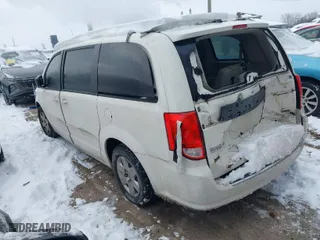 2012 Dodge Grand Caravan SE with VIN 2C4RDGBG2CR419489, listed as a IAAI auction lot 41270114 with 124,869 mi miles. Bid and sale history available at carsss.com. Image 3.