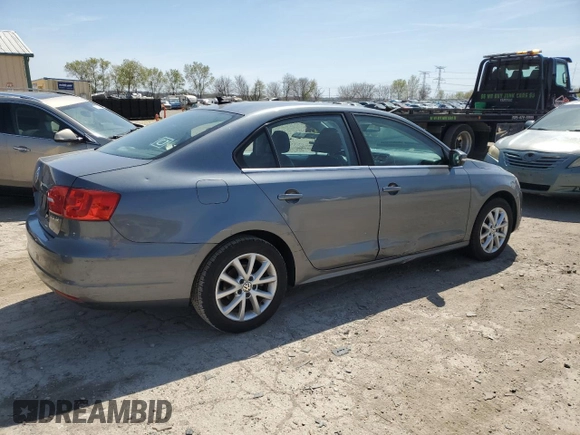 2013 Volkswagen Jetta SE z VIN 3VWDP7AJ8DM352028, wystawiony jako Copart lot #53182505 z przebiegiem 226 944 mil mil oraz Czysty tytuł • Clean title. Historia ofert i sprzedaży dostępna na DreamBid. Obrazek 3.