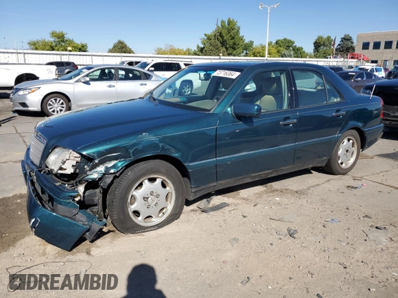 1997 Mercedes-Benz C with VIN WDBHA23EXVF507185, listed as a Copart auction lot 73716364 with 167,171 mi miles and Salvage title. Bid and sale history available at DreamBid. Image 1.