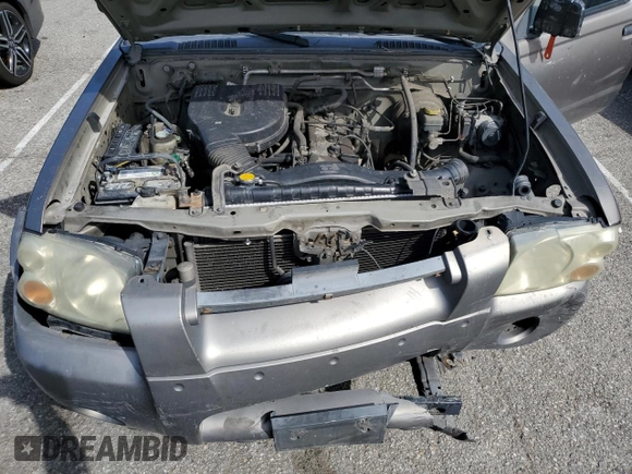 2003 Nissan Frontier XE z VIN 1N6DD26T63C454580, wystawiony jako Copart lot #49132485 z przebiegiem 310 840 mil mil oraz Szkoda całkowita • Salvage title. Historia ofert i sprzedaży dostępna na DreamBid. Obrazek 11.