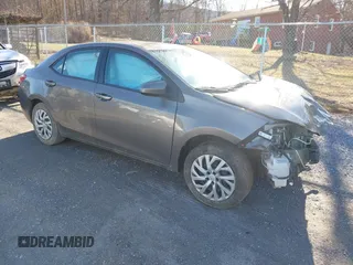 2018 Toyota Corolla L with VIN 5YFBURHE8JP753946, listed as a IAAI auction lot 41514928 with 201,871 mi miles and . Bid and sale history available at DreamBid. Image 1.