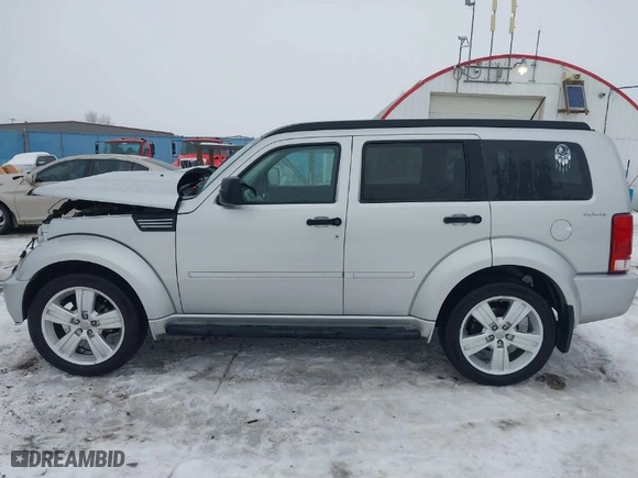 2011 Dodge Nitro Heat with VIN 1D4PU4GX1BW607458, listed as a IAAI auction lot 41279270 with 90,969 mi miles. Bid and sale history available at carsss.com. Image 15.