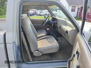 1990 Ford Ranger with VIN 1FTCR10T5LUB33370, listed as a Copart auction lot 56433285 with 110,895 mi miles and Clean title. Bid and sale history available at DreamBid. Image 5.