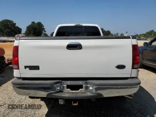 1999 Ford F-350 XL z VIN 1FTWW32F7XED47740, wystawiony jako Copart lot #69288404 z przebiegiem 201 638 mil mil oraz Szkoda całkowita • Salvage title. Historia ofert i sprzedaży dostępna na DreamBid. Obrazek 6.