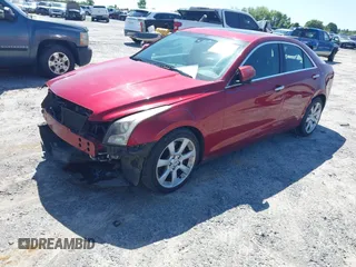 2014 Cadillac ATS Standard RWD with VIN 1G6AA5RX0E0182971, listed as a IAAI auction lot 41962216 with 135,977 mi miles and . Bid and sale history available at DreamBid. Image 2.