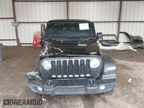 2023 Jeep Wrangler Willys with VIN 1C4HJXDG0PW617101, listed as a IAAI auction lot 42111687 with 56,415 mi miles and . Bid and sale history available at DreamBid. Image 13.