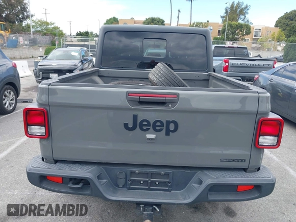 2020 Jeep Gladiator Sport S z VIN 1C6HJTAG4LL153441, wystawiony jako IAAI lot #42052329 z przebiegiem 34 660 mil mil oraz . Historia ofert i sprzedaży dostępna na DreamBid. Obrazek 16.