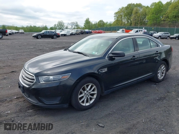 2014 Ford Taurus SE z VIN 1FAHP2D87EG165025, wystawiony jako IAAI lot #42226401 z przebiegiem 209 411 mil mil oraz . Historia ofert i sprzedaży dostępna na DreamBid. Obrazek 2.
