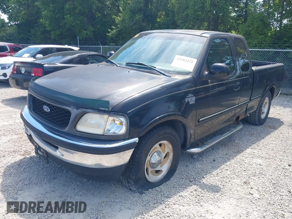1998 Ford F-150 with VIN 1FTZX1762WNB88647, listed as a IAAI auction lot 42682271 with 187,520 mi miles and . Bid and sale history available at DreamBid. Image 2.