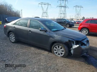 2007 Toyota Camry LE with VIN 4T1BK46KX7U525522, listed as a IAAI auction lot 41198095 with 77,465 mi miles and . Bid and sale history available at DreamBid. Image 1.