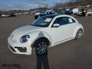 2019 Volkswagen Beetle SE with VIN 3VWJD7AT6KM713525, listed as a IAAI auction lot 41508195 with 73,360 mi miles. Bid and sale history available at carsss.com. Image 2.