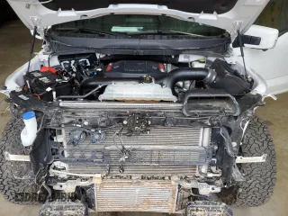 2023 Ford F-150 Raptor with VIN 1FTFW1RG5PFB97799, listed as a Copart auction lot 47471485 with 27,282 mi miles and Salvage Title. Bid and sale history available at DreamBid. Image 11.