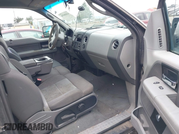 2005 Ford F-150 STX with VIN 1FTRX12W65NA60997, listed as a IAAI auction lot 41836976 with 170,400 mi miles. Bid and sale history available at carsss.com. Image 5.