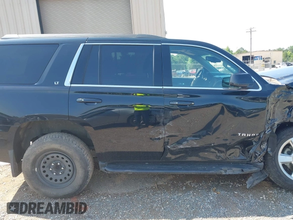 2019 Chevrolet Tahoe LT with VIN 1GNSKBKC1KR264324, listed as a IAAI auction lot 42474572 with 139,142 mi miles and . Bid and sale history available at DreamBid. Image 13.