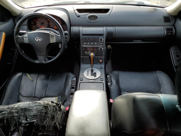 2004 Infiniti G35 w/Leather z VIN JNKCV51F34M708688, wystawiony jako Copart lot #59127945 z przebiegiem 199 727 mil mil oraz Szkoda całkowita • Salvage title. Historia ofert i sprzedaży dostępna na DreamBid. Obrazek 8.