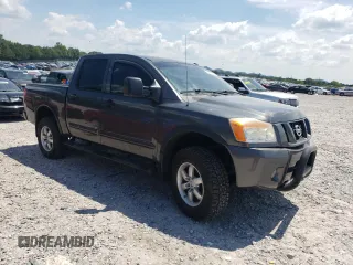 2011 Nissan Titan SL with VIN 1N6BA0ECXBN322611, listed as a Copart auction lot 63002925 with 159,785 mi miles and Salvage title. Bid and sale history available at DreamBid. Image 4.