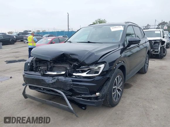 2021 Volkswagen Tiguan S with VIN 3VV1B7AX4MM025586, listed as a IAAI auction lot 41889996 with 21,777 mi miles and . Bid and sale history available at DreamBid. Image 2.