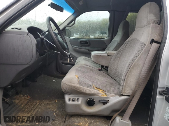 1999 Ford F-150 XL с VIN 1FTRX18L5XNB35835, выставлен на аукционе Copart как лот 52898645 с пробегом 218 637 миль миль и Списание • Salvage title. История ставок и продаж доступна на DreamBid. Изображение 7.