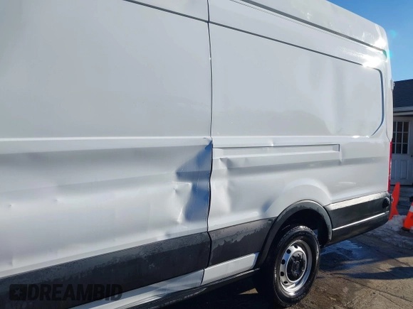 2020 Ford Transit Cargo with VIN 1FTBW3X82LKA91396, listed as a IAAI auction lot 41310803 with 60,760 mi miles and . Bid and sale history available at DreamBid. Image 6.