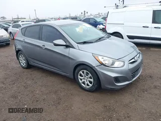 2014 Hyundai Accent GS with VIN KMHCT5AE3EU176306, listed as a IAAI auction lot 41572325 with 179,277 mi miles. Bid and sale history available at carsss.com. Image 1.
