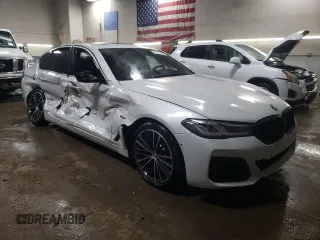 2023 BMW 5 Series 530e z VIN WBA13AG00PCM94423, wystawiony jako Copart lot #41517625 z przebiegiem 16 339 mil mil oraz Szkoda całkowita • Salvage title. Historia ofert i sprzedaży dostępna na DreamBid. Obrazek 4.
