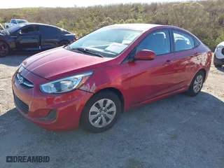 2015 Hyundai Accent GLS with VIN KMHCT4AE8FU833113, listed as a IAAI auction lot 40975977 with 143,038 mi miles. Bid and sale history available at carsss.com. Image 2.