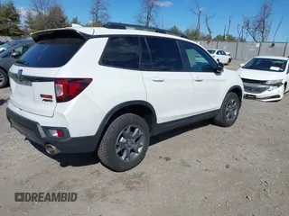2024 Honda Passport TrailSport с VIN 5FNYF8H69RB016415, выставлен на аукционе IAAI как лот 41701049 с пробегом 10 365 миль миль и . История ставок и продаж доступна на DreamBid. Изображение 4.
