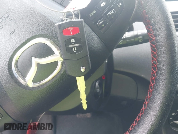 2012 Mazda 3 i Touring z VIN JM1BL1L74C1600792, wystawiony jako IAAI lot #42197953 z przebiegiem 139 930 mil mil oraz . Historia ofert i sprzedaży dostępna na DreamBid. Obrazek 11.