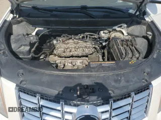 2016 Cadillac SRX Luxury Collection with VIN 3GYFNBE39GS516719, listed as a Copart auction lot 59988365 with 138,054 mi miles and Salvage title. Bid and sale history available at DreamBid. Image 12.