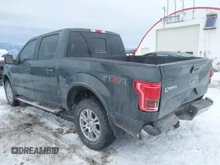 2015 Ford F-150 XLT with VIN 1FTEW1EP6FFB48630, listed as a IAAI auction lot 41597442 with 128,428 mi miles. Bid and sale history available at carsss.com. Image 3.