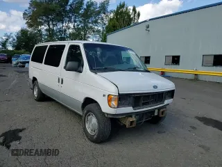 2002 Ford Econoline Passenger XL with VIN 1FMRE11WX2HA57114, listed as a Copart auction lot 68766174 with 167,382 mi miles and Salvage Title. Bid and sale history available at DreamBid. Image 12.