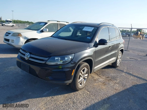 2017 Volkswagen Tiguan S with VIN WVGAV7AX9HK001881, listed as a IAAI auction lot 42048245 with 51,648 mi miles. Bid and sale history available at carsss.com. Image 17.