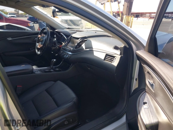 2017 Chevrolet Impala LT with VIN 2G1105S35H9158921, listed as a IAAI auction lot 41974553 with 138,955 mi miles and . Bid and sale history available at DreamBid. Image 5.