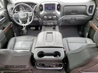 2020 GMC Sierra 1500 Denali z VIN 1GTU9FEL3LZ194035, wystawiony jako Copart lot #57321105 z przebiegiem 52 469 mil mil oraz Szkoda całkowita • Salvage title. Historia ofert i sprzedaży dostępna na DreamBid. Obrazek 8.