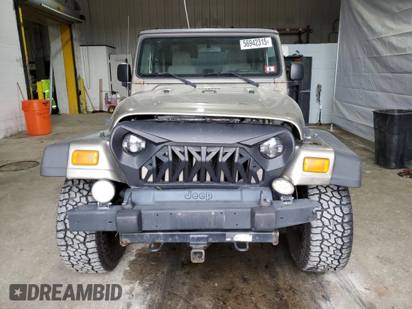 2005 Jeep Wrangler Sport z VIN 1J4FA49S75P325028, wystawiony jako Copart lot #56942315 z przebiegiem 169 988 mil mil oraz Szkoda całkowita • Salvage title. Historia ofert i sprzedaży dostępna na DreamBid. Obrazek 5.