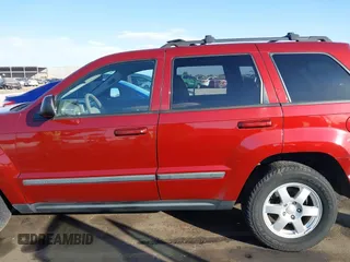 2008 Jeep Grand Cherokee Laredo with VIN 1J8GR48K08C233266, listed as a IAAI auction lot 41291164 with 159,208 mi miles. Bid and sale history available at carsss.com. Image 14.