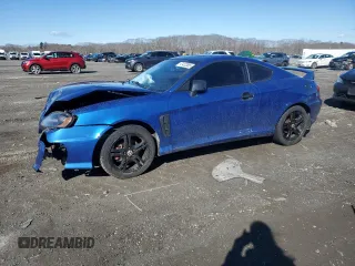 2005 Hyundai Tiburon GT z VIN KMHHN65F35U169736, wystawiony jako Copart lot #47422885 z przebiegiem 136 205 mil mil oraz Tytuł czysty. Historia ofert i sprzedaży dostępna na DreamBid. Obrazek 1.
