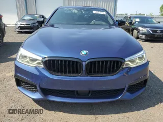 2020 BMW 5 Series M550i xDrive with VIN WBAJS7C0XLBN96338, listed as a Copart auction lot 60591815 with 73,910 mi miles and Salvage title. Bid and sale history available at DreamBid. Image 5.