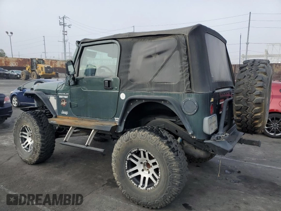 2002 Jeep Wrangler Sahara with VIN 1J4FA59S42P742978, listed as a Copart auction lot 46707685 with 77,272 mi miles and Salvage Title. Bid and sale history available at carsss.com. Image 2.