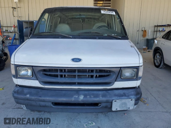 2002 Ford Econoline Cargo with VIN 1FTRE14292HB60778, listed as a Copart auction lot 74345234 with 173,366 mi miles and Salvage Title. Bid and sale history available at DreamBid. Image 5.
